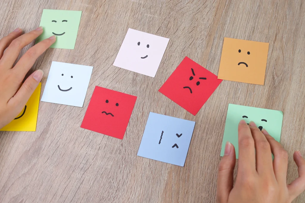 hands arrange colorful sticky notes with drawn fac 2026 01 11 10 11 11 utc copy