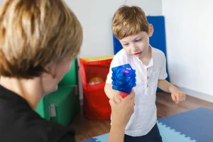 Articles 15 physical therapist helps a young boy with cerebral 2026 03 09 02 57 25 utc copy